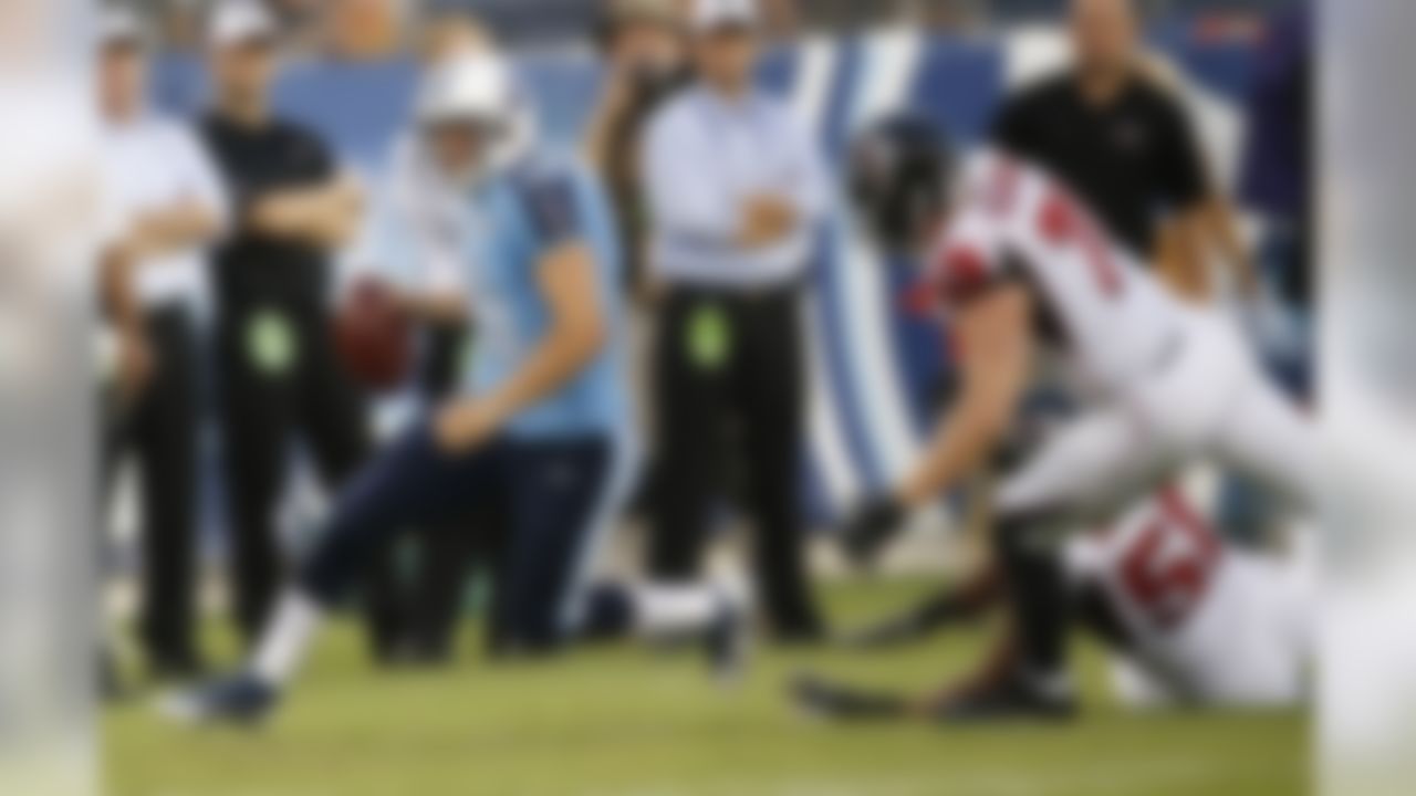 Tennessee Titans quarterback Jake Locker (10) runs out of the pocket against the Atlanta Falcons during the first half of an NFL preseason football game, Saturday, Aug. 24, 2013, in Nashville, Tenn. Locker fumbles on the play and Atlanta Falcons recovered. (AP Photo/John Russell)