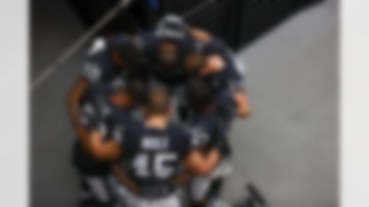 Las Vegas Raiders players huddle up before an NFL football game against the Buffalo Bills on Sunday, October 4, 2020 in Las Vegas, Nevada.