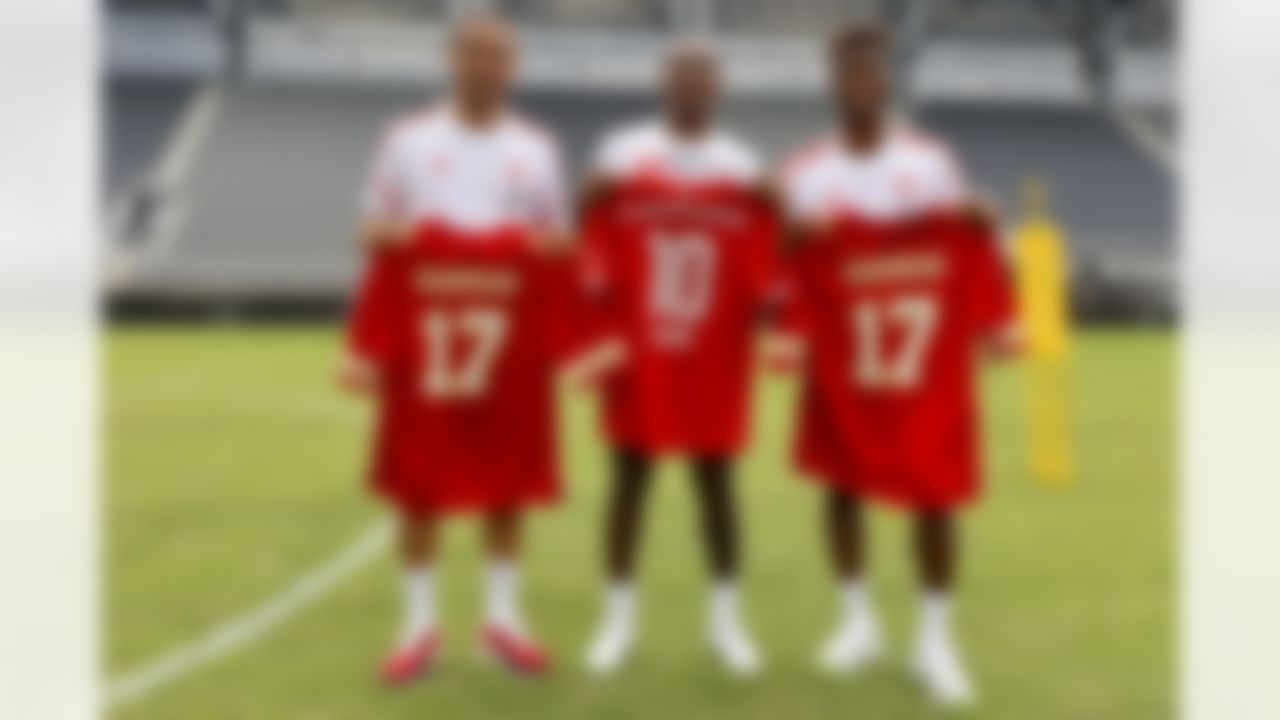 Kansas City Chiefs wide receiver Mecole Hardman (17) poses for a photo with FC Munich Bayern forward Kingsley Coman (11) and forward Leroy Sané during Game Recognize Game event on Thursday, July 21, 2022 in Washington.