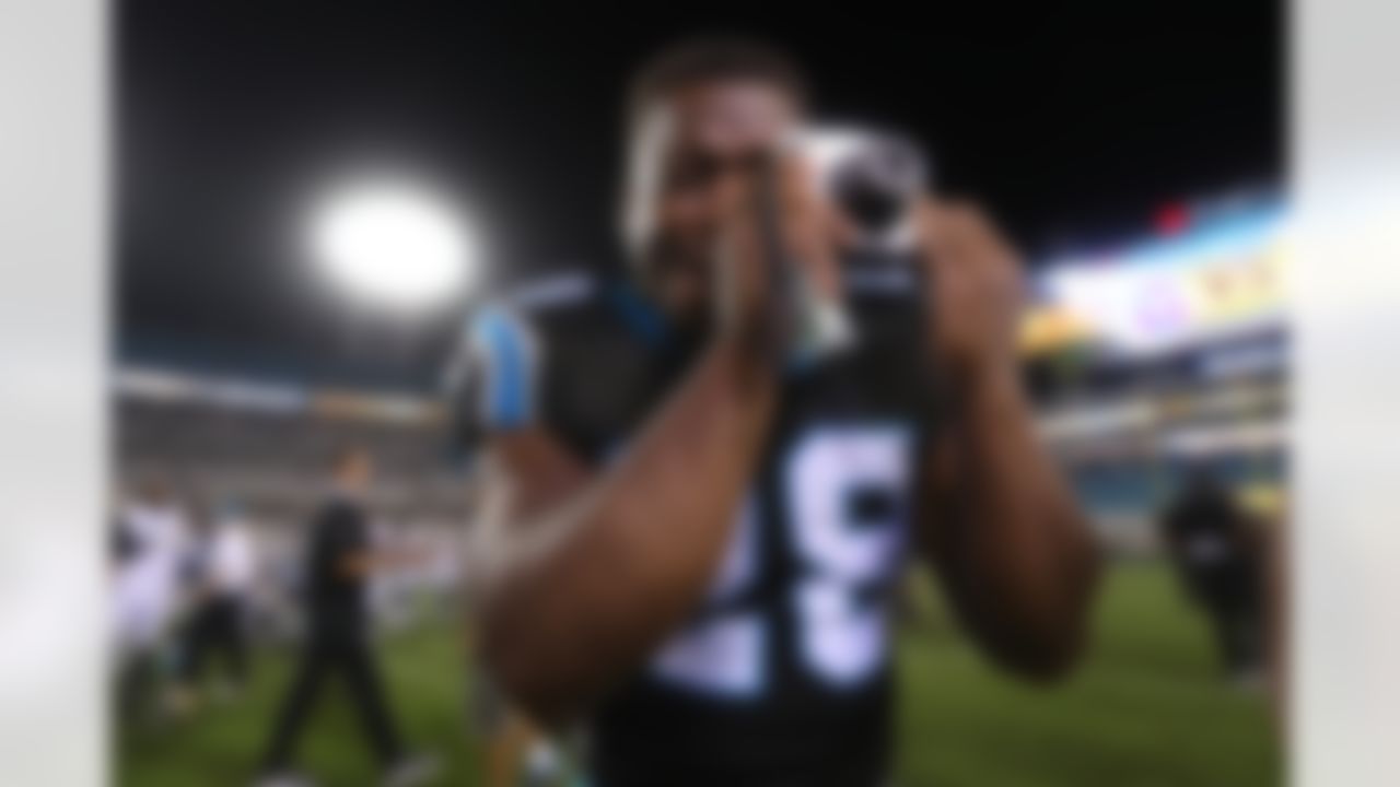 Carolina Panthers running back Jonathan Stewart (28) takes a picture after an NFL football game against the Jacksonville Jaguars at EverBank Field, Thursday, August 24, 2017 in Jacksonville, Fla. The Panthers defeated the Jaguars 24-23. (Perry Knotts/NFL)
