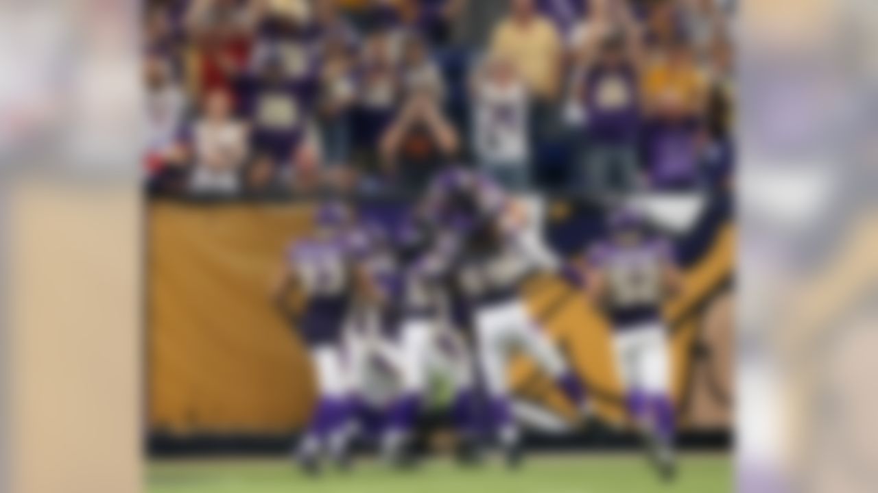 MINNEAPOLIS - SEPTEMBER 21:  Cornerback Antoine Winfield #28 of the Minnesota Vikings celebrates with the defensive unit after scoring a touchdown following his sack and fumble recovery against the Carolina Panthers at the HH Humphrey Metrodome on September 21, 2008 in Minneapolis, Minnesota.  (Photo by David Sherman/Getty Images)