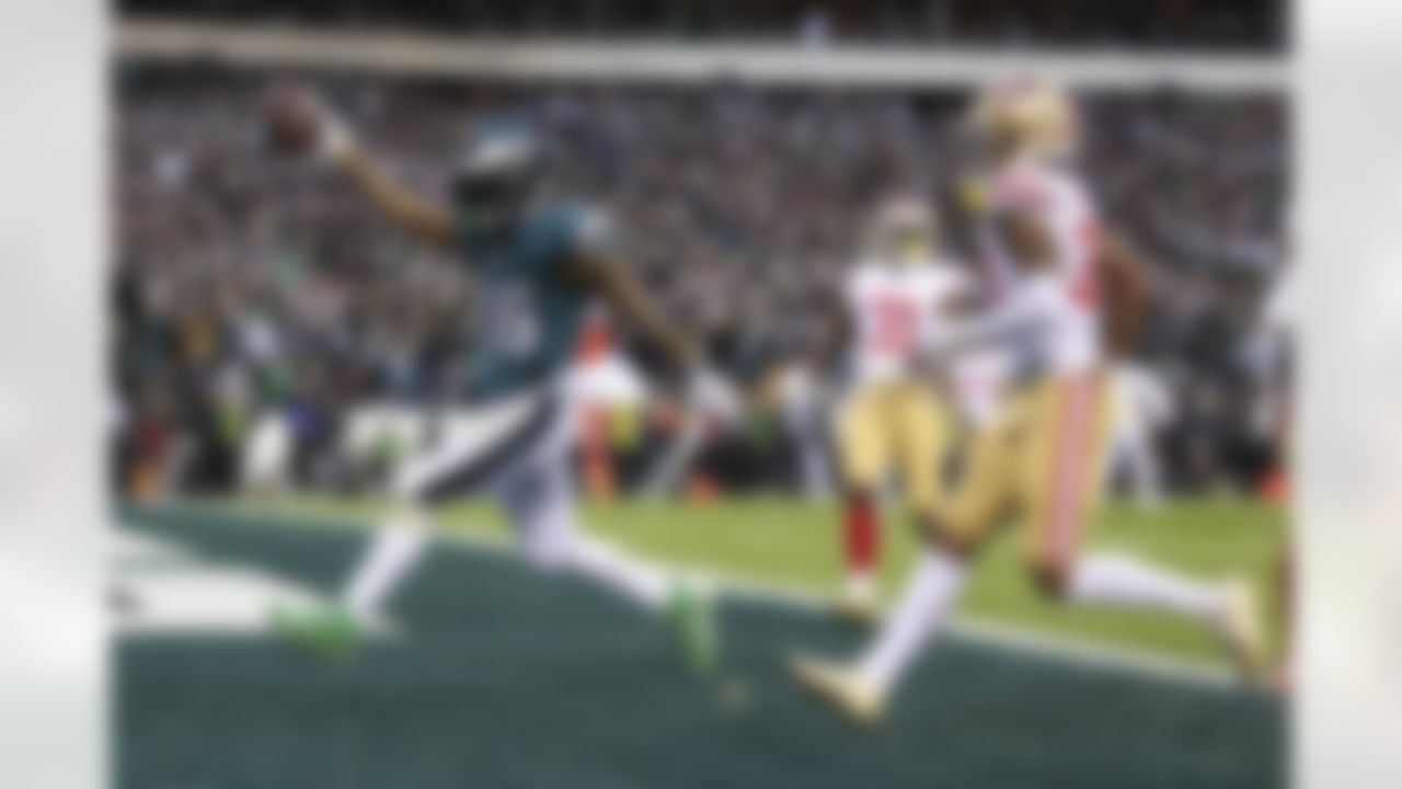 Philadelphia Eagles running back Miles Sanders (26) rushes for a touchdown during an NFL Conference Championship playoff game against the San Francisco 49ers on Sunday, January 29, 2023 in Philadelphia, Pennsylvania.