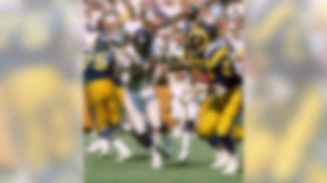 Minnesota Vikings defensive end Chris Doleman (56) chases Rams Hall of Fame running back Eric Dickerson (29) during a 21-16 Vikings victory at Anaheim Stadium in 1987. (AP Photo/NFL Photos)