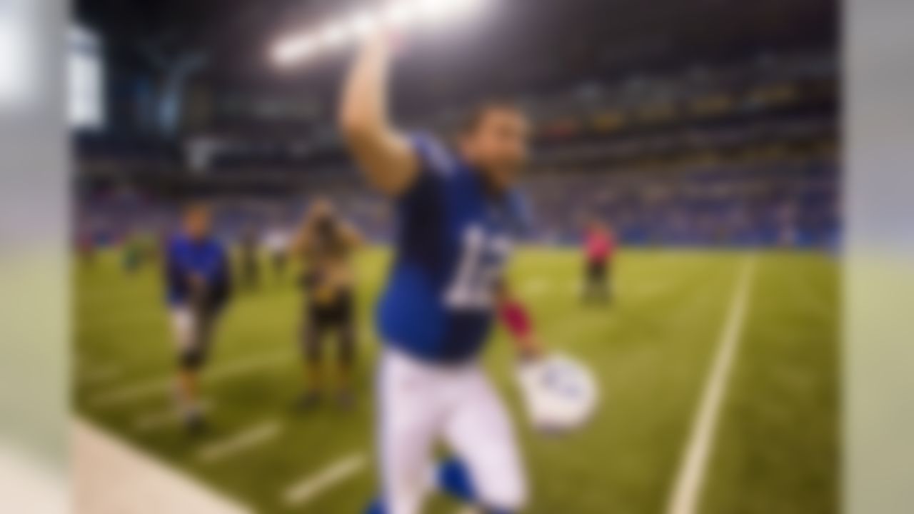 Indianapolis Colts quarterback Andrew Luck (12) celebrates the Colts' 34-28 victory over the Seattle Seahawks at Lucas Oil Stadium in Indianapolis, IN on October 6, 2013.  (Todd Rosenberg/NFL)