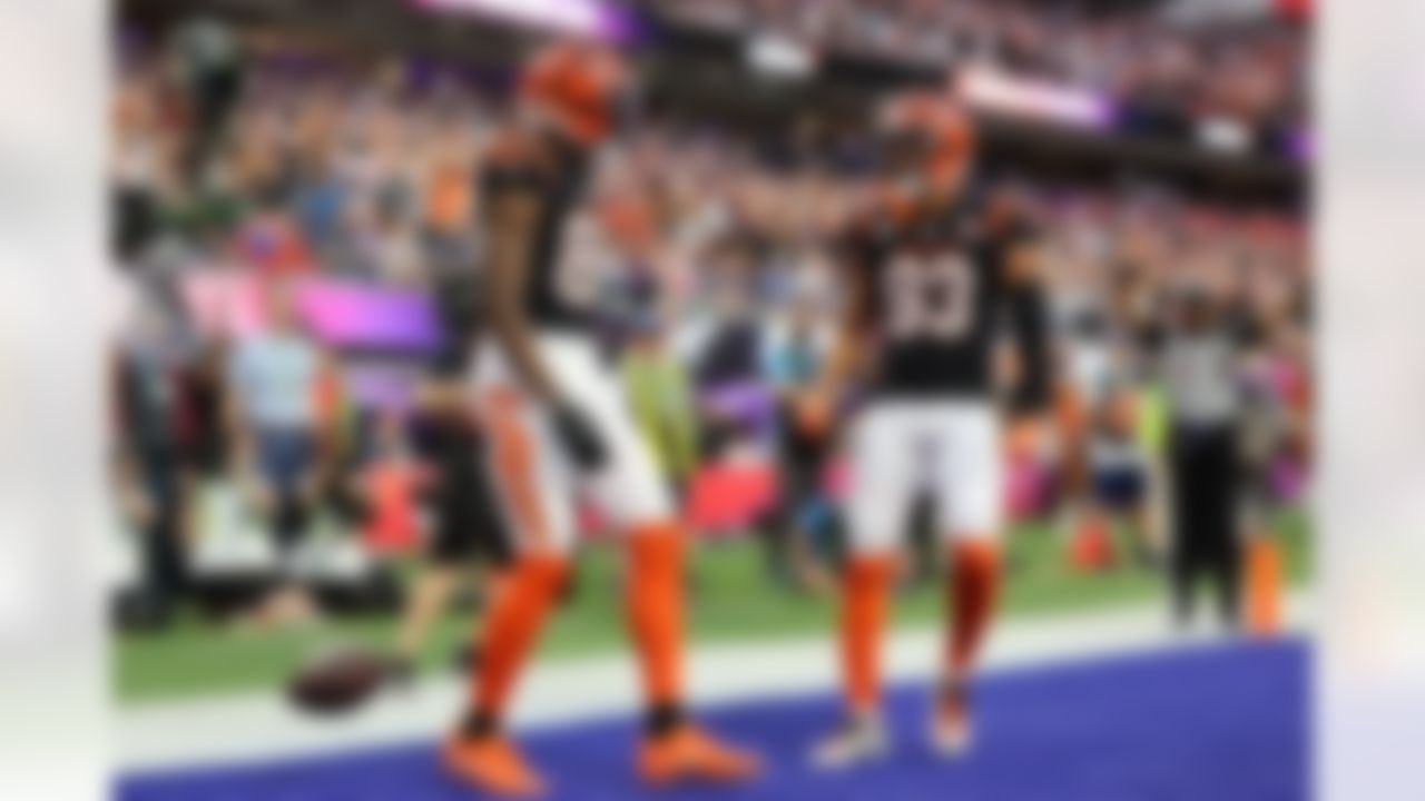 Cincinnati Bengals wide receiver Tee Higgins (85) celebrates after a touchdown with wide receiver Tyler Boyd (83) during Super Bowl LVI against the Los Angeles Rams on Sunday, February 13, 2022 in Inglewood, California.