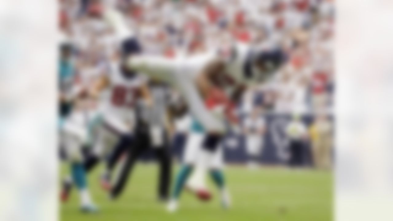 Houston Texans running back Arian Foster (23) leaps into the end zone for a touchdown against the Miami Dolphins in the second quarter of an NFL football game, Sunday, Sept. 9, 2012, in Houston. (AP Photo/Eric Gay)