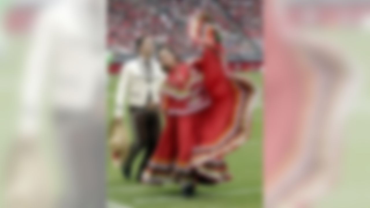 Ballet folklorico dancers celebrate Hispanic Heritage as they dance during halftime in an NFL football game between the Philadelphia Eagles and the Arizona Cardinals Sunday, Sept. 23, 2012, in Glendale, Ariz.(AP Photo/Rick Scuteri)