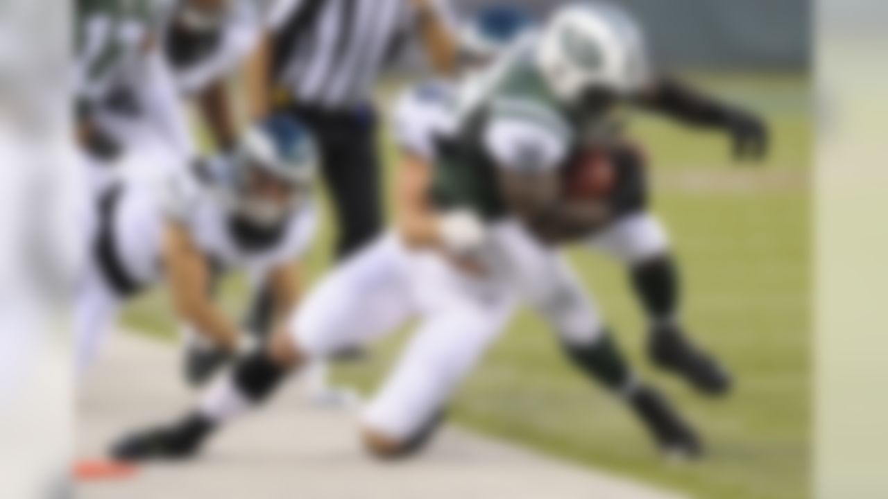 Philadelphia Eagles' Kiko Alonso (50) tackles New York Jets' Zac Stacy (38) during the first half of a preseason NFL football game Thursday, Sept. 3, 2015  in East Rutherford, N.J. (AP Photo/Bill Kostroun)