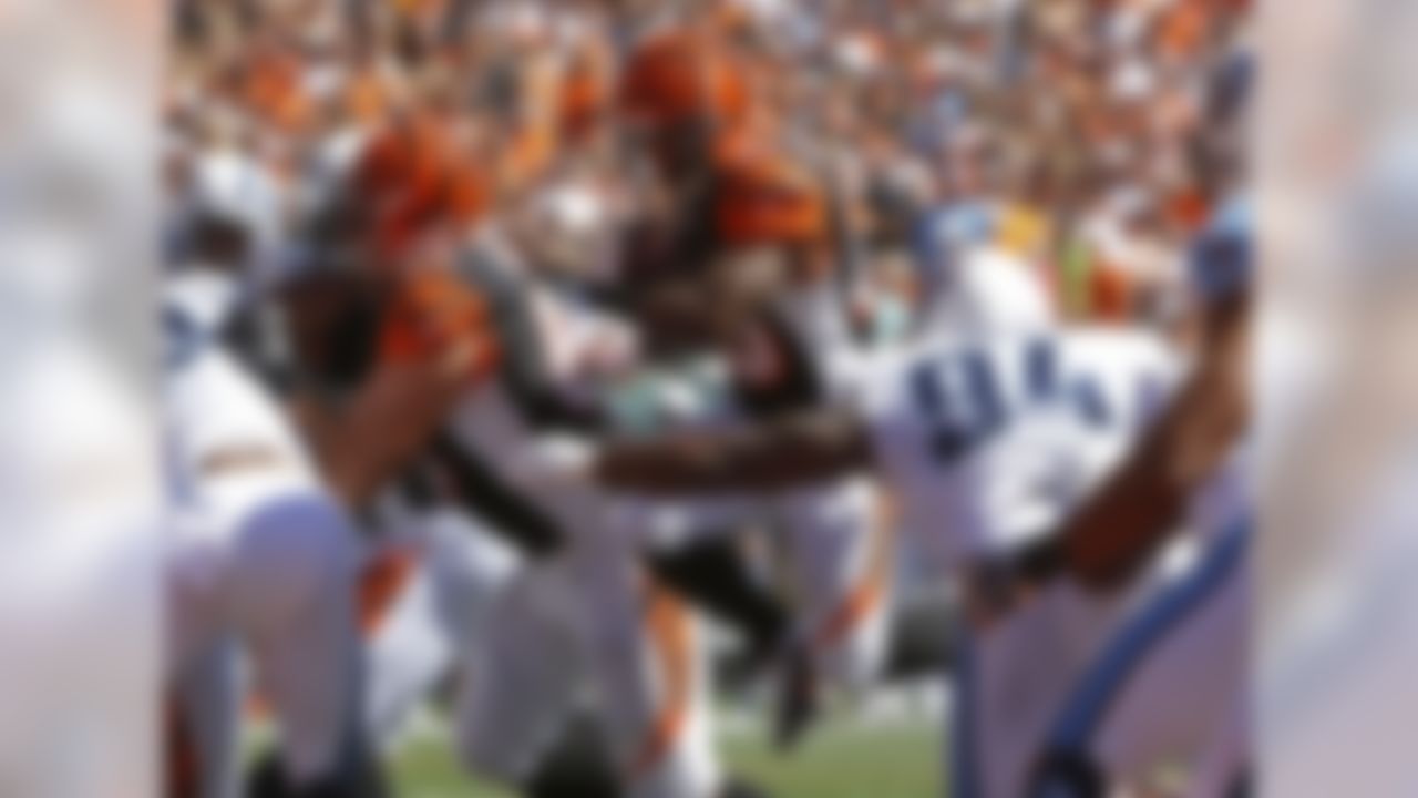 Cincinnati Bengals running back Giovani Bernard (25) jumps into the end zone for a 1-yard touchdown run in the first half of an NFL football game against the Tennessee Titans, Sunday, Sept. 21, 2014, in Cincinnati. (AP Photo/David Kohl)