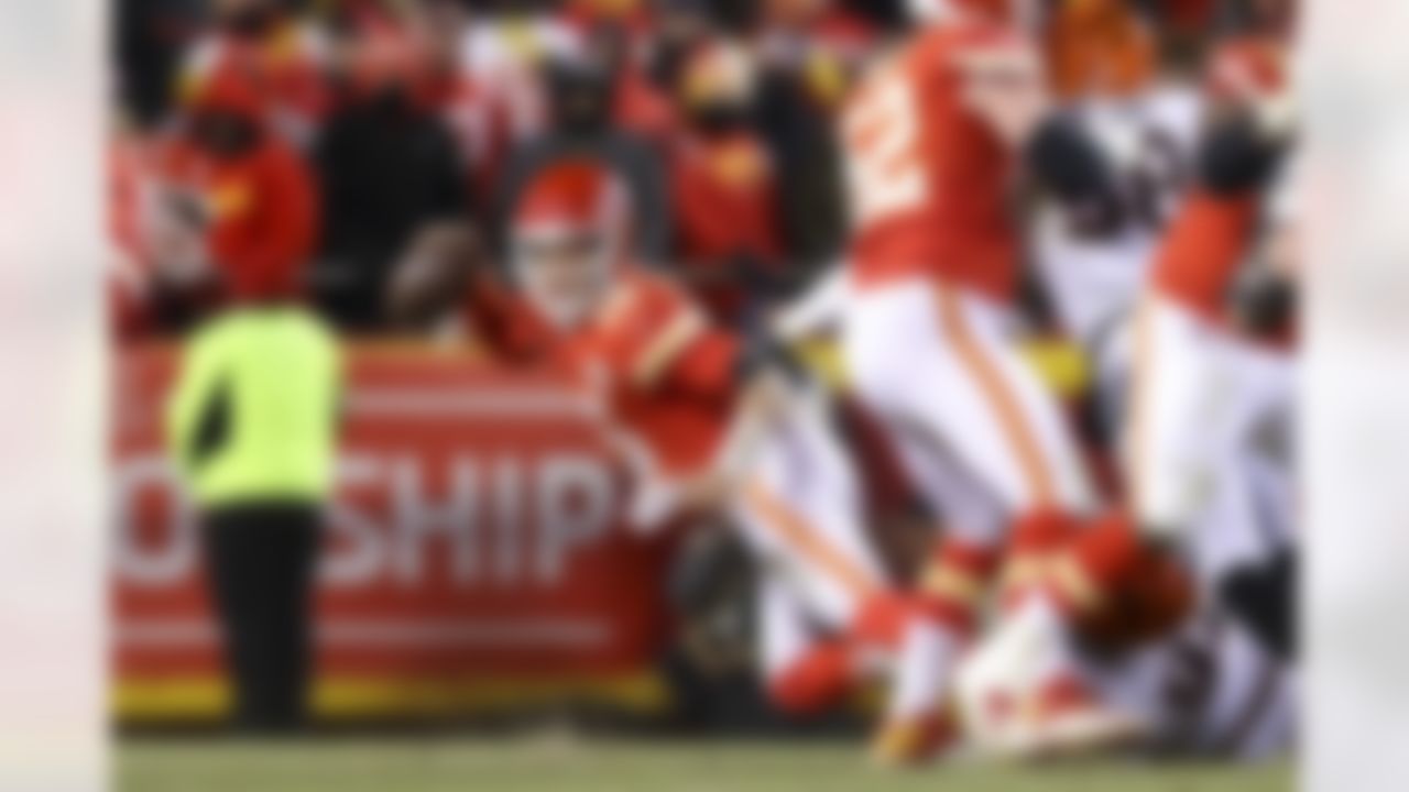 Kansas City Chiefs quarterback Patrick Mahomes (15) gets tackled during an NFL Conference Championship playoff game against the Cincinnati Bengals on Sunday, January 29, 2023 in Kansas City, Missouri.