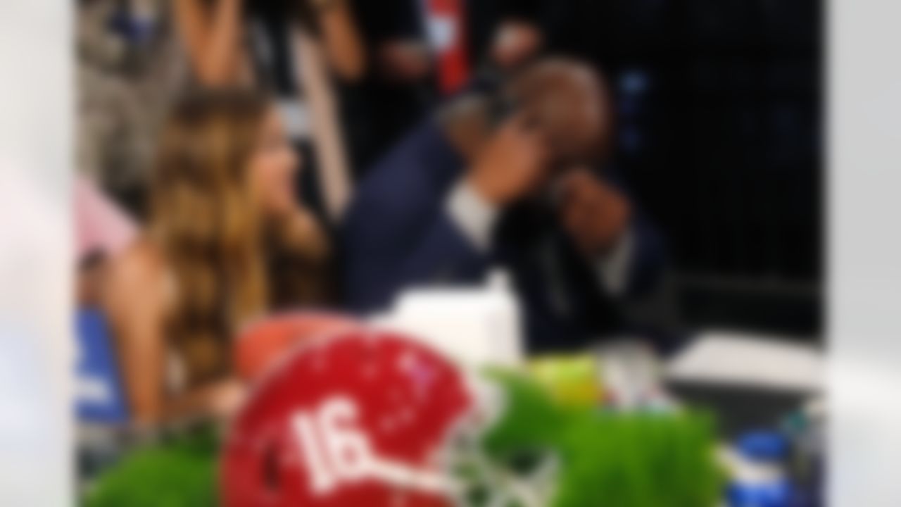 Alabama defensive tackle A'Shawn Robinson speaks on the phone backstage after being selected by the Detroit Lions during the 2016 NFL Draft at the Auditorium Theatre on Friday, April 29, 2016 in Chicago. (Ben Liebenberg/NFL)