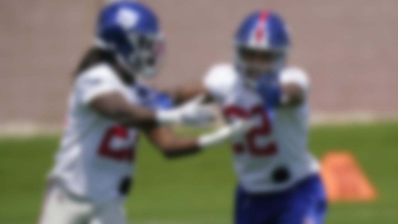 New York Giants cornerbacks Adoree' Jackson, right, fends off cornerback Logan Ryan, left, as they go through a drill during an NFL football practice, Thursday, June 10, 2021, in East Rutherford, N.J.