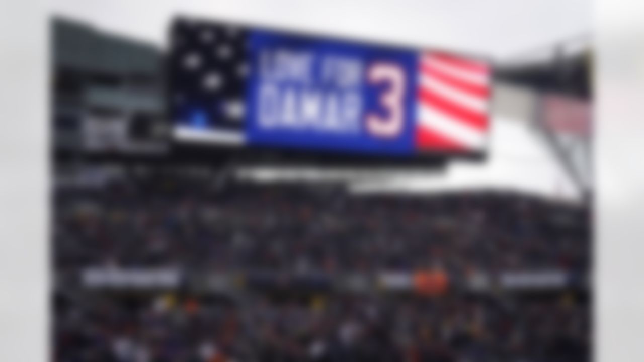 A monitor displays Love for Damar to honor injured Buffalo Bills player Damar Hamlin before an NFL football game between the Chicago Bears and the Minnesota Vikings, Sunday, Jan. 8, 2023, in Chicago.