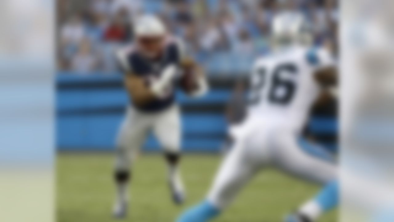 New England Patriots' Tyler Gaffney (36) runs against the Carolina Panthers during the first half of a preseason NFL football game in Charlotte, N.C., Friday, Aug. 26, 2016. (AP Photo/Bob Leverone)