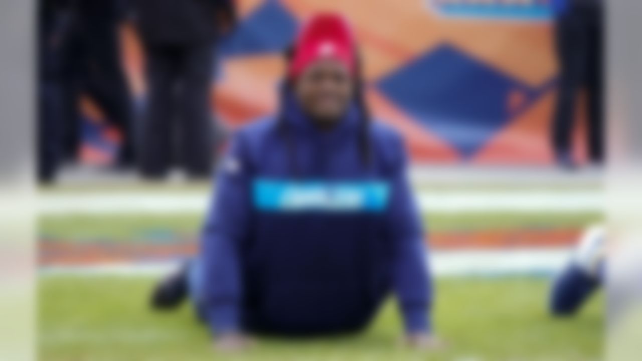 Los Angeles Chargers running back Melvin Gordon wears a University of Wisconsin hat as he warms up before an NFL football game against the Denver Broncos, Sunday, Dec. 30, 2018, in Denver. (AP Photo/Jack Dempsey)