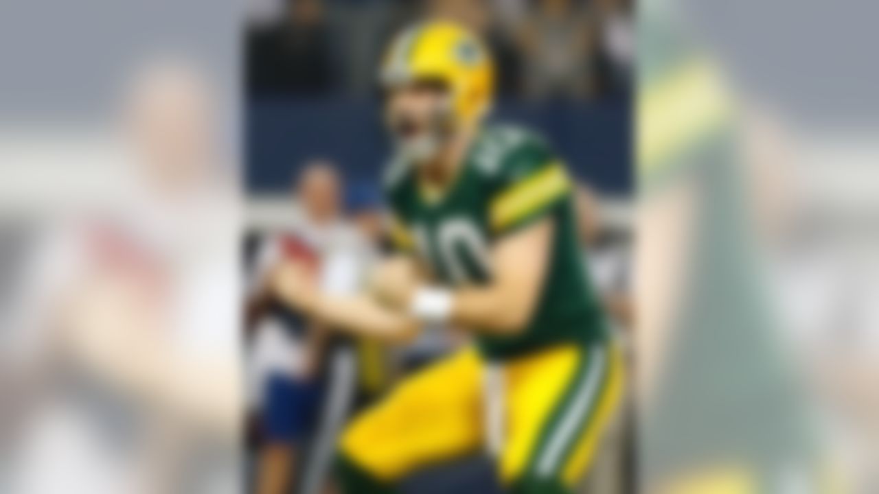 Green Bay Packers quarterback Matt Flynn #10 celebrates after the Packers scored the winning touchdown during an NFL football game between the Green Bay Packers against the Dallas Cowboys at AT&T Stadium on Sunday December 15, 2013 in Arlington, Texas. (Aaron M. Sprecher/NFL)