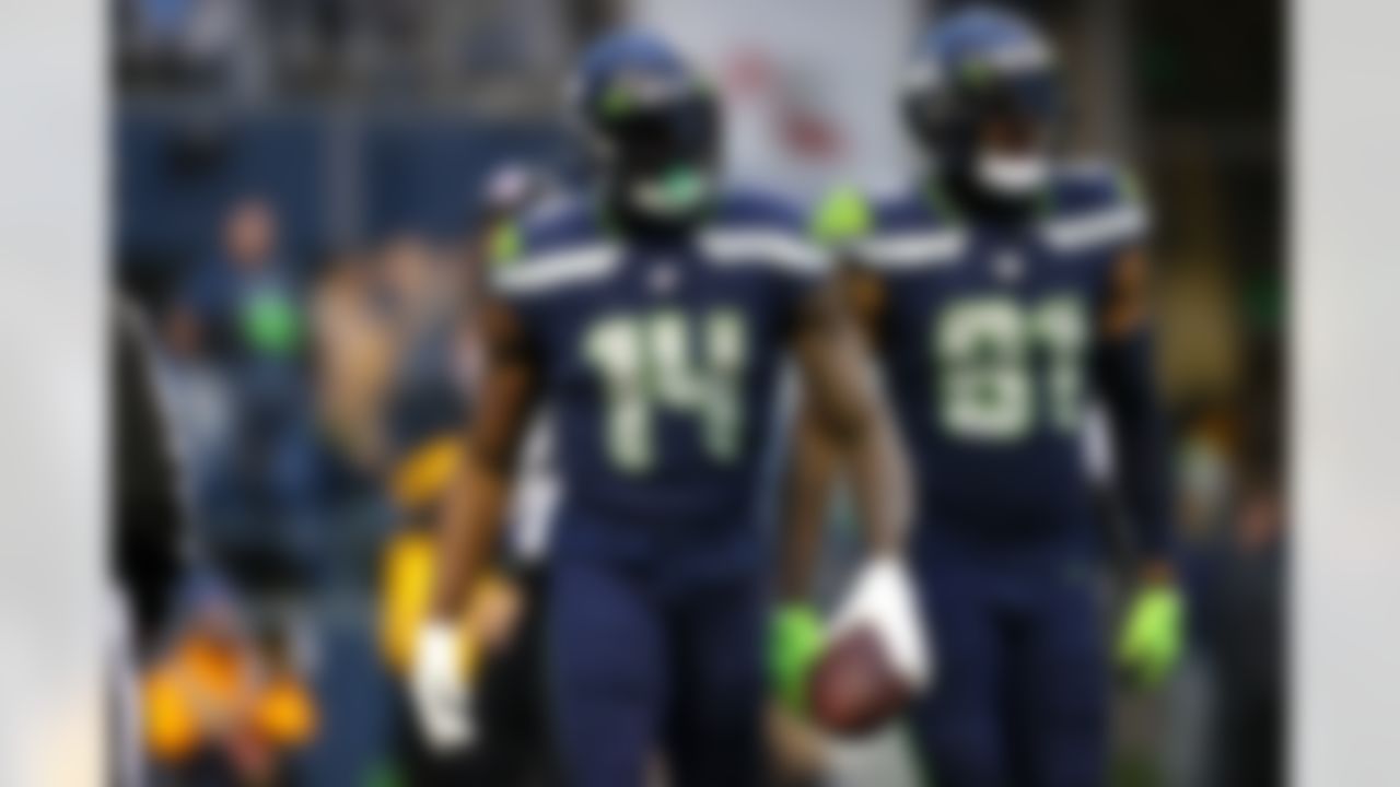 Seattle Seahawks wide receiver DK Metcalf (14) celebrates a touchdown during an NFL football game against the Detroit Lions on Sunday, January 2, 2022 in Seattle, Washington.