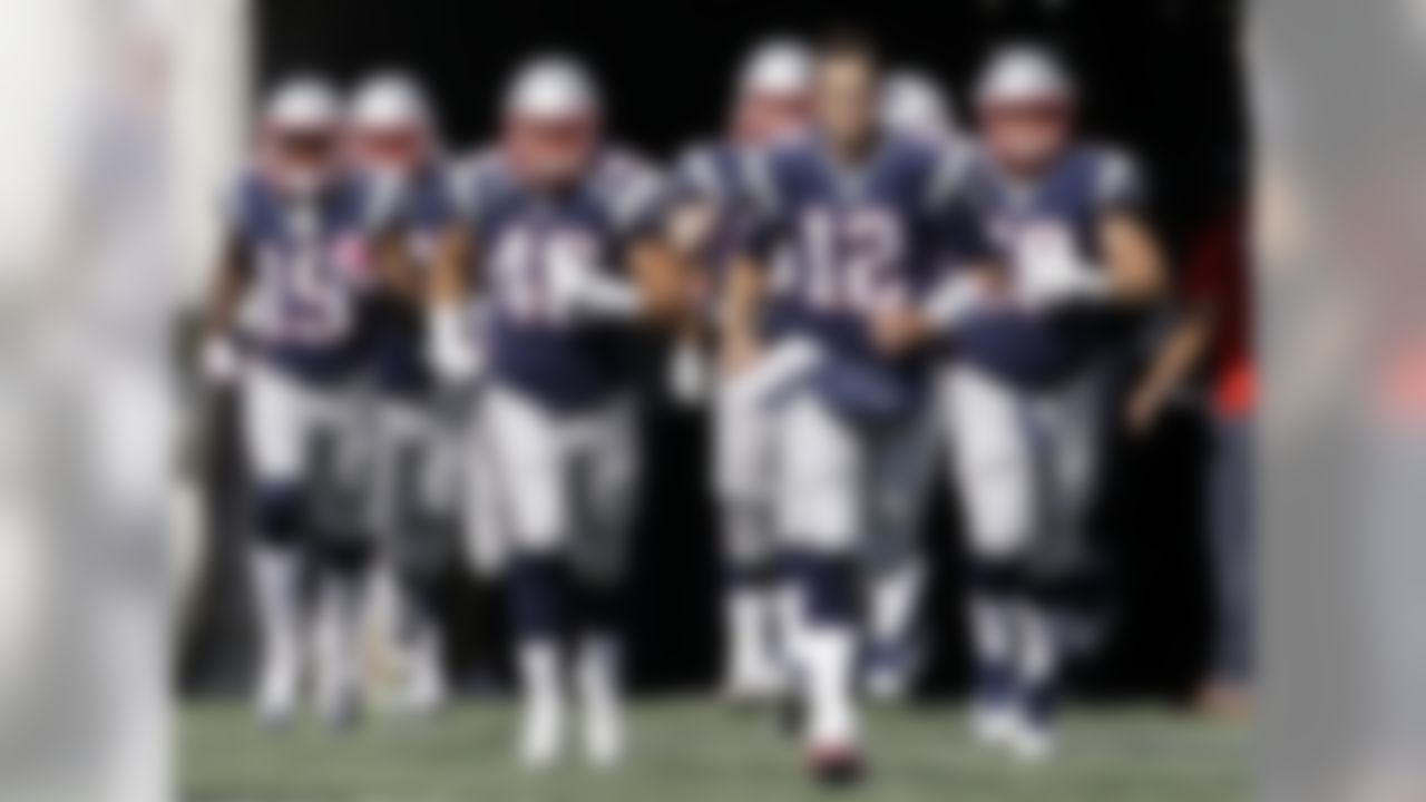 New England Patriots quarterback Tom Brady (12) leads the team onto the field for an NFL football game against the Cincinnati Bengals, Sunday, Oct. 16, 2016, in Foxborough, Mass. (AP Photo/Elise Amendola)