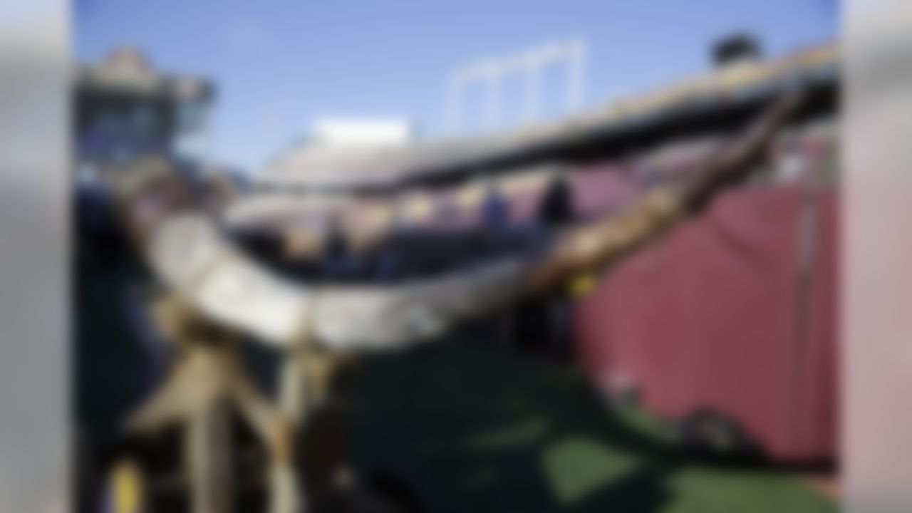 A backup gjallahorn is brought out to the field as the main horn was broken off to some pieces from the cold weather before an NFL wild-card football game between the Minnesota Vikings and the Seattle Seahawks, Sunday, Jan. 10, 2016, in Minneapolis. (AP Photo/Nam Y. Huh)