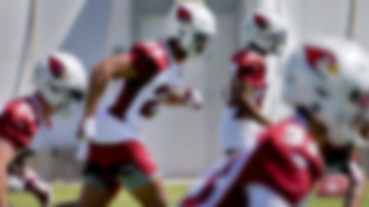 Arizona Cardinals' Zaven Collins (25) works out during an NFL football rookie minicamp, Friday, May 14, 2021, in Tempe, Ariz.