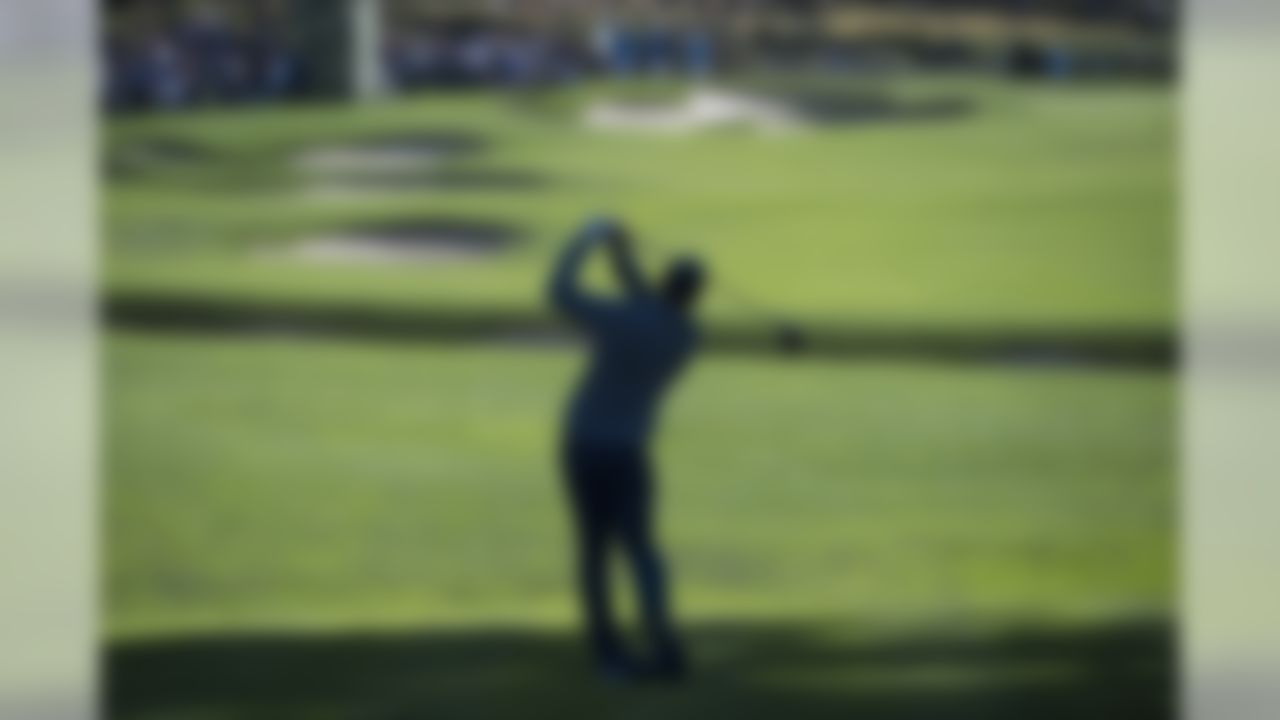 Green Bay Packers quarterback Aaron Rodgers follows through on his tee shot at the 4th tee during the third round of the AT&T Pebble Beach Pro-Am golf tournament at Pebble Beach Golf Links on Feb. 11, 2017 in Pebble Beach, Calif. (Michael Madrid/USA TODAY Sports)