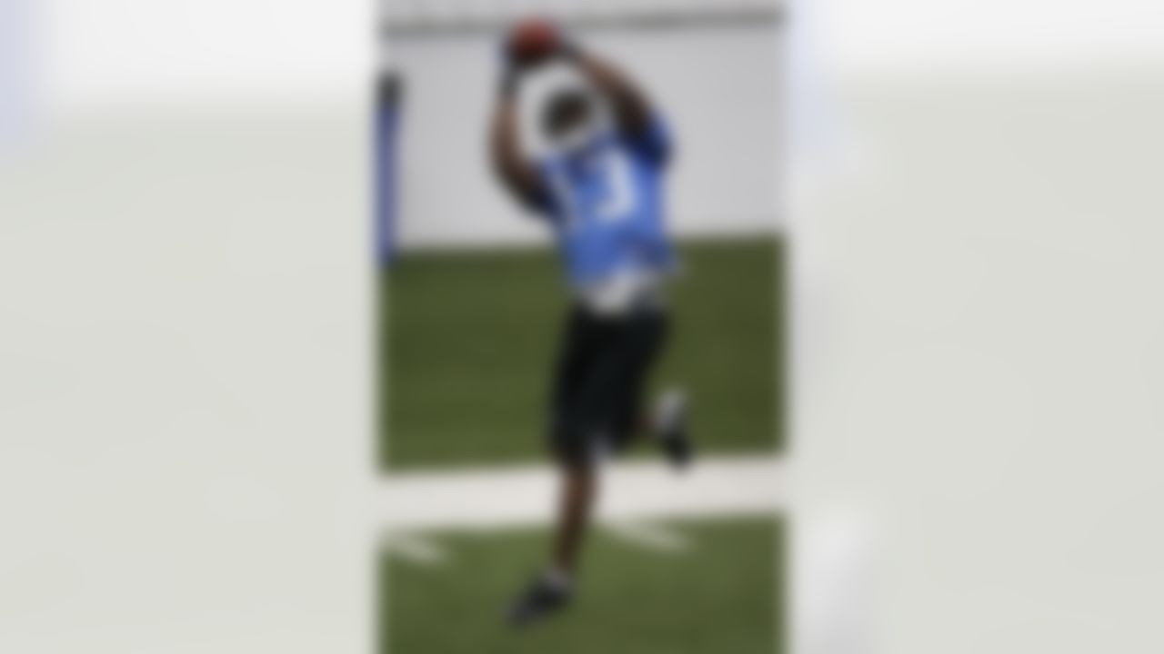 ALLEN PARK, MI - MAY 01: Derrick Williams #13 of the Detroit Lions catches a pass during rookie orientation camp at the Detroit Lions Headquarters and Training Facility on May 1, 2009 in Allen Park, Michigan.  (Photo by Gregory Shamus/Getty Images)