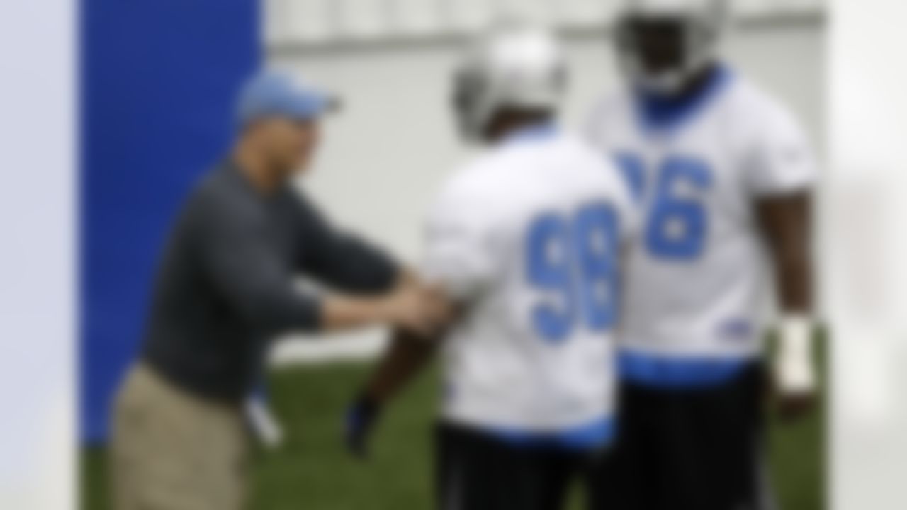 ALLEN PARK, MI - MAY 03: Head coach Rod Marinelli of the Detroit Lions works with Landon Cohen #98 and Andre Fluellen #96 during rookie training camp at the Detroit Lions Headquarters and Training Facility on May 3, 2008 in Allen Park, Michigan. (Photo by Gregory Shamus/Getty Images)