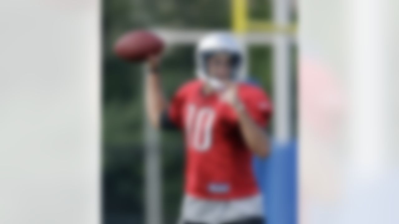 Detroit Lions quarterback Zac Robinson throws during drills at the NFL football team's training camp in Allen Park, Mich., Friday, Aug. 5, 2011. (AP Photo/Carlos Osorio)