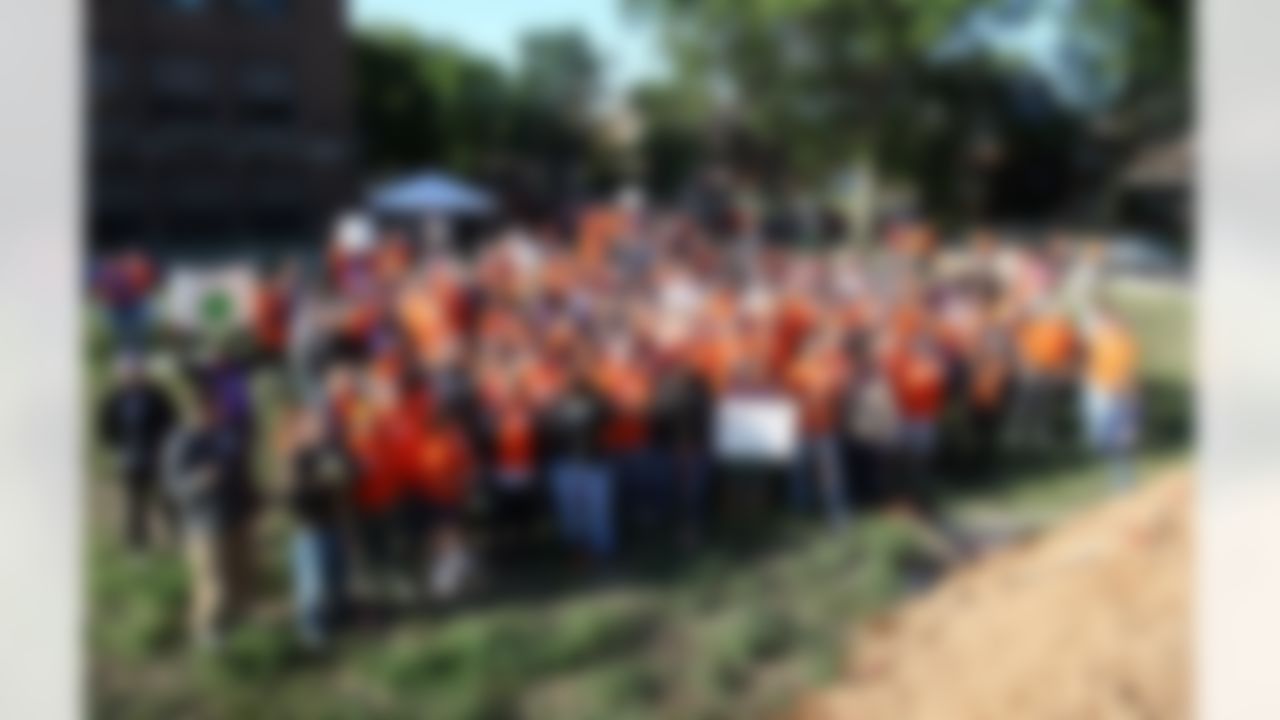 Mike Furrey, The Home Depot, KaBOOM! and Joy Preparatory Academy celebrate after a great day on the playground. (Photo by Tom Copeland/Home Depot)