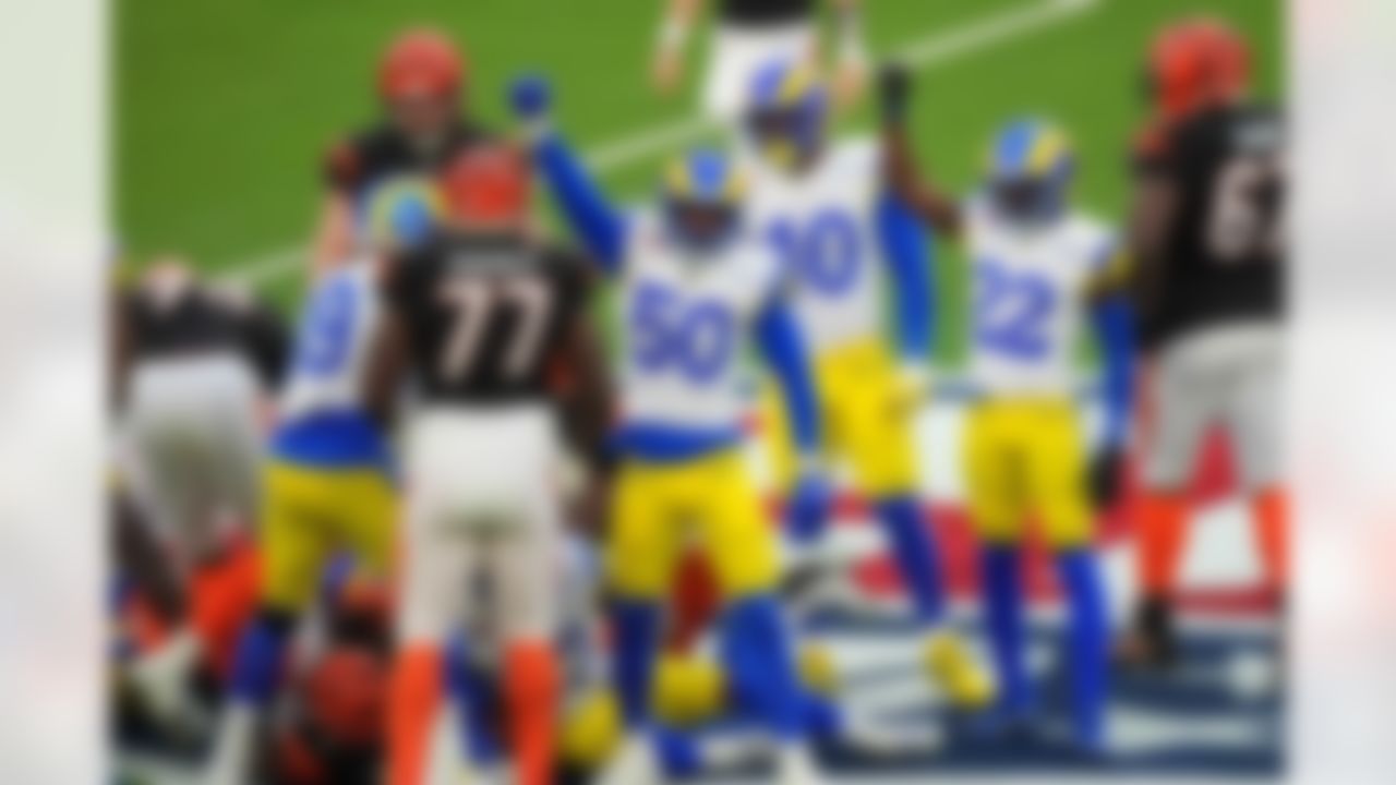 Los Angeles Rams linebacker Ernest Jones (50) and defensive back David Long (22) raise their fists during Super Bowl LVI on Sunday, February 13, 2022 in Inglewood, California.