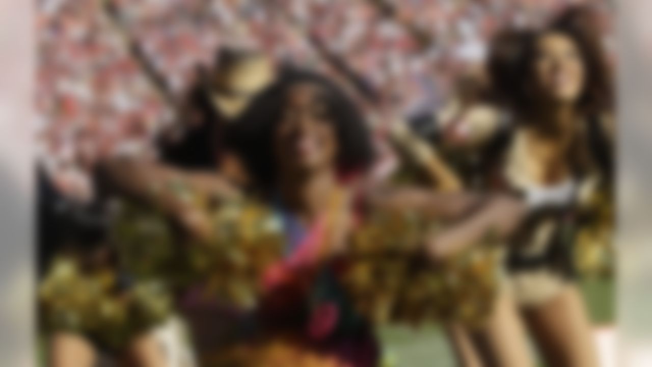 San Francisco 49ers cheerleaders are shown in Halloween costumes in the third quarter of an NFL football game against the Cleveland Browns in San Francisco, Sunday, Oct. 30, 2011. (AP Photo/Marcio Jose Sanchez)