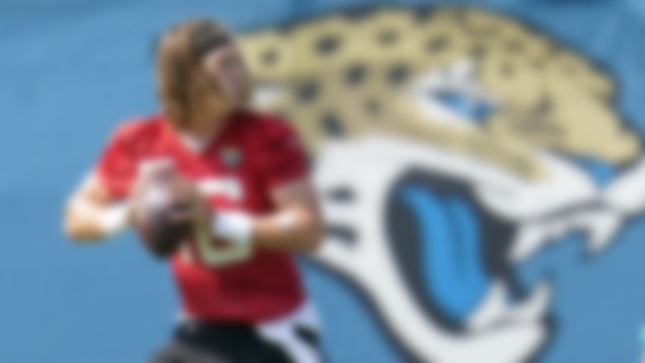 Jacksonville Jaguars quarterback Trevor Lawrence runs a drill during an NFL football practice, Tuesday, June 15, 2021, in Jacksonville, Fla.