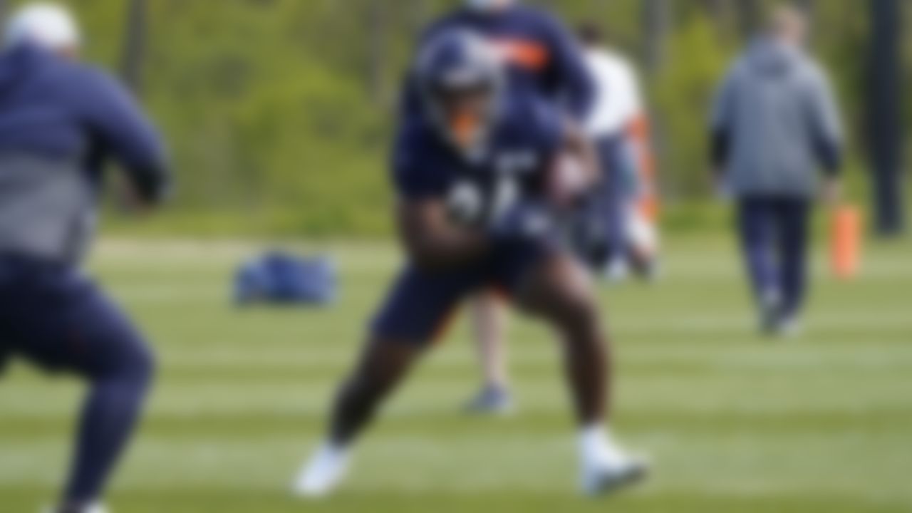 Chicago Bears running back Khalil Herbert (24) runs during the NFL football team's rookie minicamp Friday, May, 14, 2021, in Lake Forest Ill.