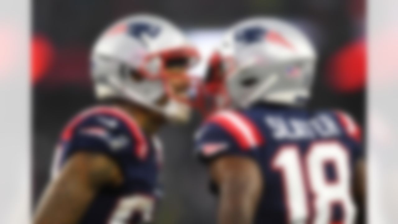 New England Patriots wide receiver Kendrick Bourne (84) celebrates with wide receiver Matthew Slater (18) during an NFL football game against the Jacksonville Jaguars on Sunday, January 2, 2022 in Foxborough, Massachusetts.