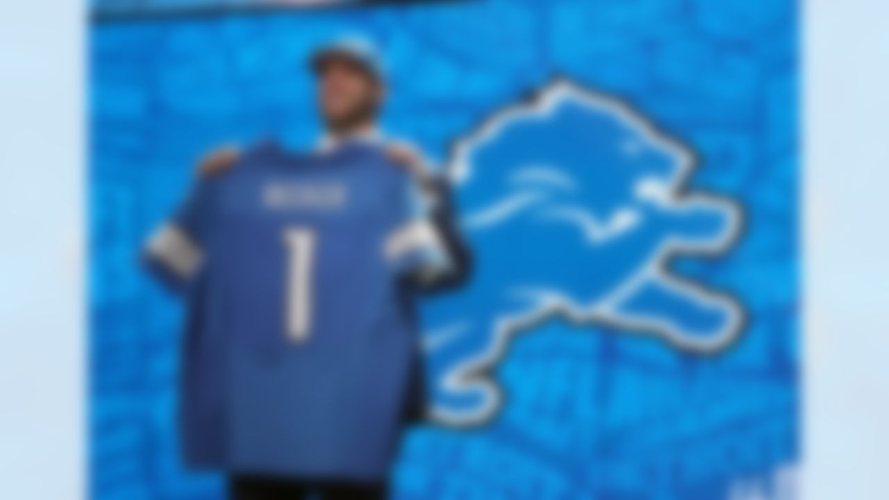 Ohio State offensive tackle Taylor Decker holds up his jersey after being drafted by the Detroit Lions during the 2016 NFL Draft at the Auditorium Theatre on Thursday, April 28, 2016 in Chicago. (Perry Knotts/NFL)