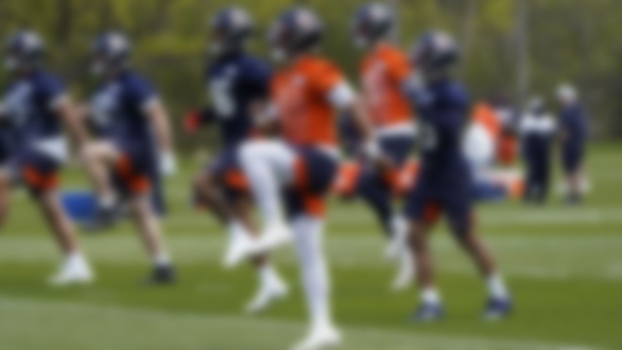 Chicago Bears quarterback Justin Fields (1) works out during the NFL football team's rookie minicamp Friday, May, 14, 2021, in Lake Forest Ill.