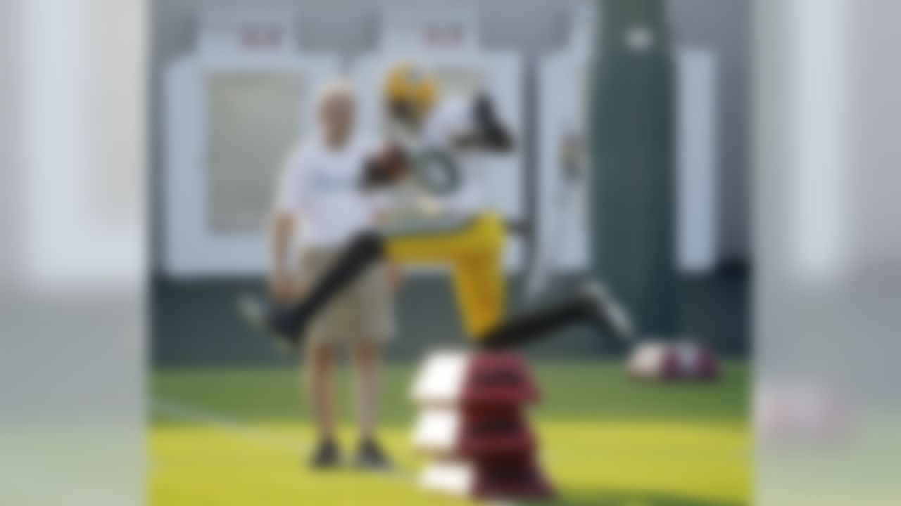 Green Bay Packers' Donald Driver jumps over some pads during a drill at NFL football training camp Tuesday, Aug. 3, 2010, in Green Bay, Wis. (AP Photo/Morry Gash)