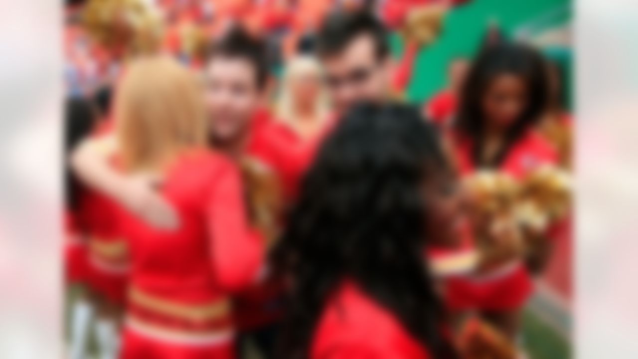 KANSAS CITY, MO - SEPTEMBER 14: American Idol winner David Cook and brother Andrew Cook greet Kansas City Chiefs cheerleaders prior to the start of the game between the Oakland Raiders and the Kansas City Chiefs on Saptember 14, 2008 at Arrowhead Stadium in Kansas City, Missouri. (Photo by Jamie Squire/Getty Images)