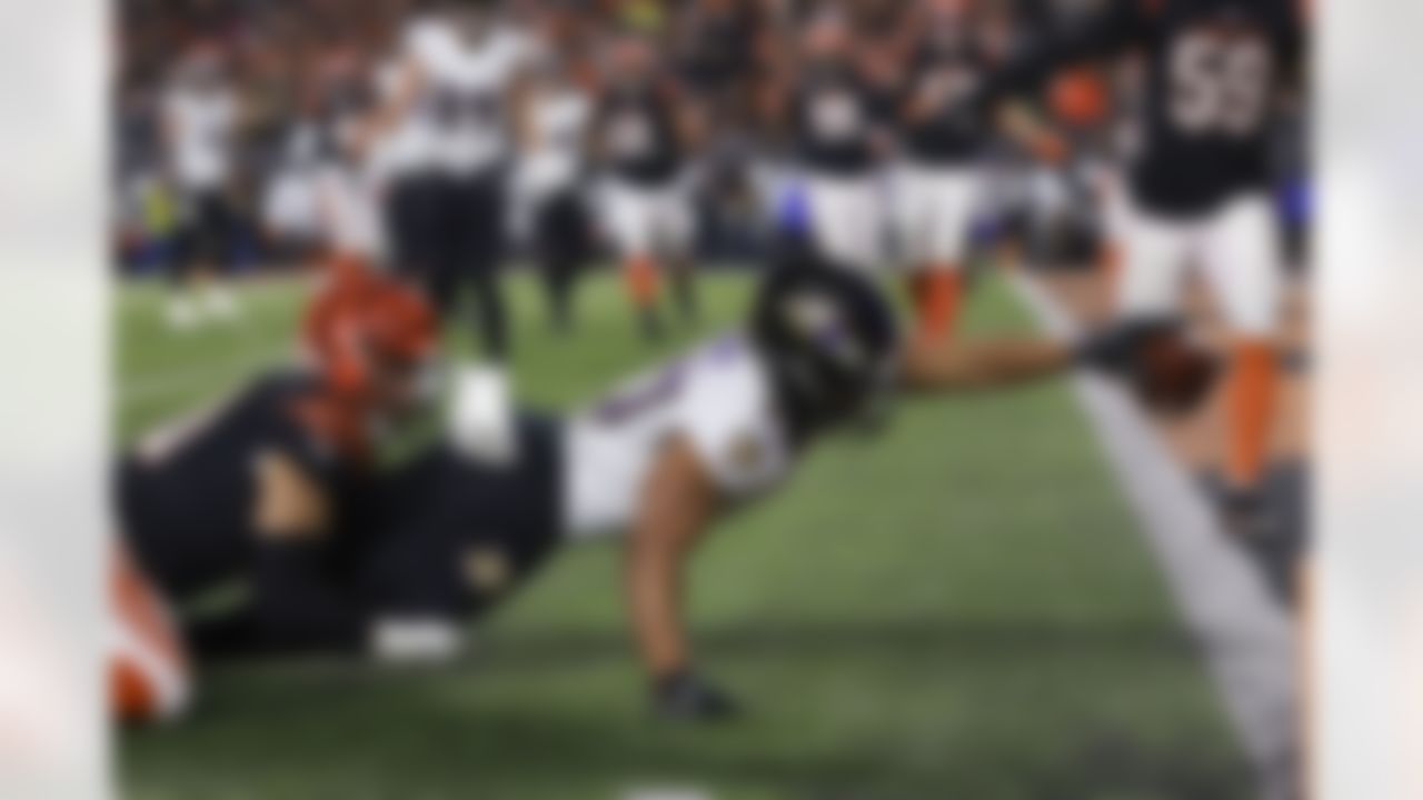 Baltimore Ravens running back J.K. Dobbins (27) catches a pass for a touchdown during an NFL Super Wild Card Weekend playoff game against the Cincinnati Bengals on Sunday, January 15, 2023 in Cincinnati, Ohio.