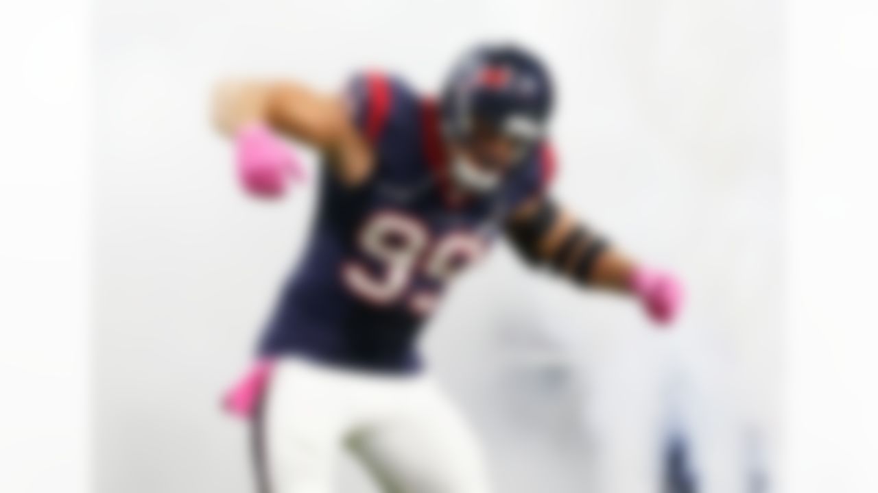 Houston Texans defensive end J.J. Watt (99) enters the field during player introductions prior to an NFL football game against the Indianapolis Colts at NRG Stadium on Thursday, Oct. 8, 2015 in Houston, Texas. Indianapolis won 27-20. (Aaron M. Sprecher via AP)