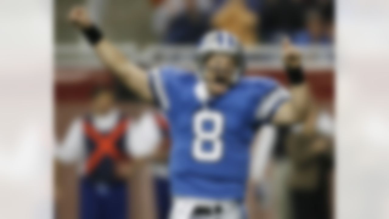 DETROIT - NOVEMBER 23: Jon Kitna #8 of the Detroit Lions reacts after throwing a first quarter touchdown pass against the Miami Dolphins on November 23, 2006 at Ford Field in Detroit, Michigan. Photo by Getty Images
