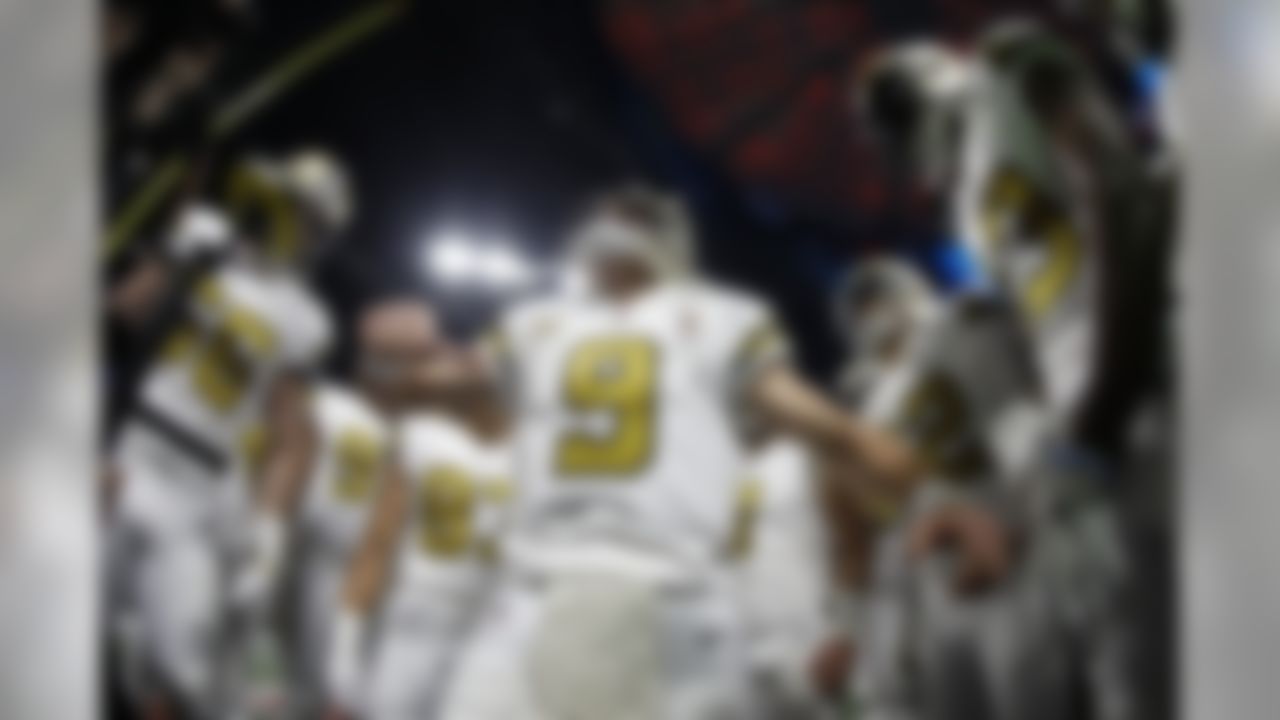 New Orleans Saints quarterback Drew Brees (9) in the pregame huddle before an NFL regular season football game against the Atlanta Falcons on Dec. 7, 2017 in Atlanta. (Ric Tapia/NFL)