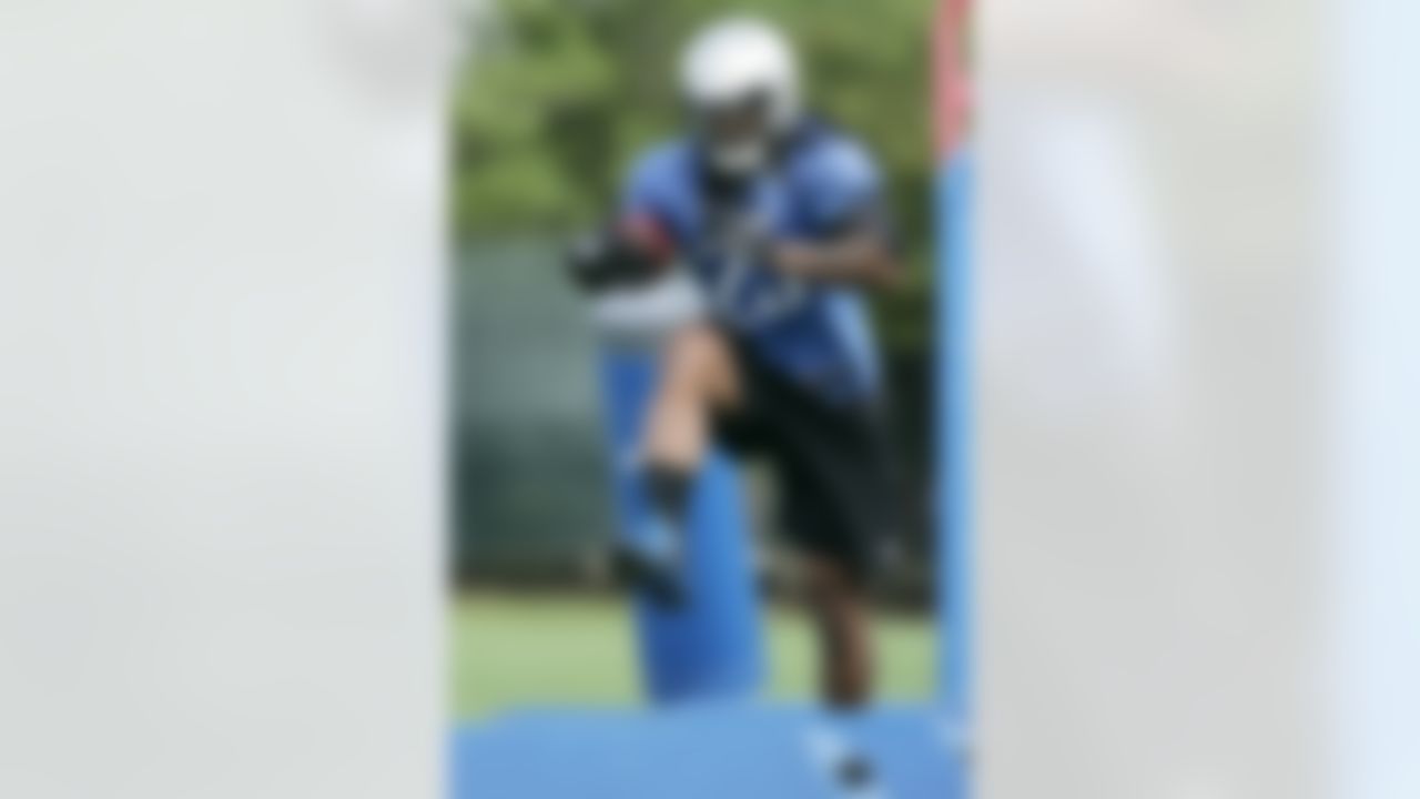 Detroit Lions Mikel Leshoure runs through an agility drill during an NFL football training camp Saturday, July 28, 2012, in Allen Park, Mich. (AP Photo/Duane Burleson)