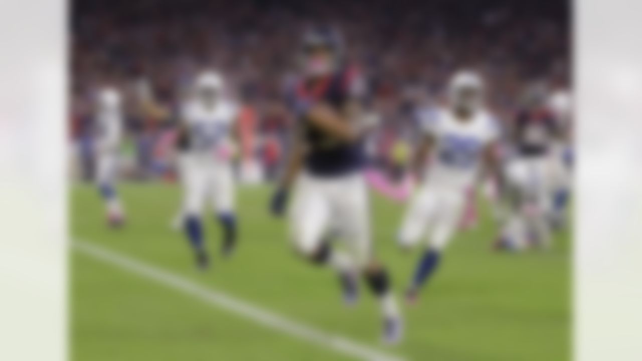 Houston Texans' Arian Foster (23) runs for a touchdown against the Indianapolis Colts during the second quarter of an NFL football game in Houston on Oct. 9. 2014. (AP Photo/Patric Schneider, File)