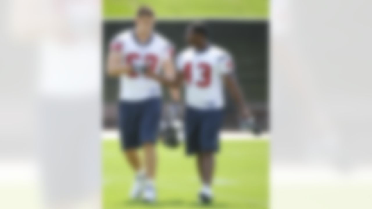 Houston Texans' rookie tackle Steve Maneri (68) greets rookie running back Ben Tate (43) during the team's opening NFL football mini camp Monday, May 17, 2010 in Houston. (AP Photo/Dave Einsel)