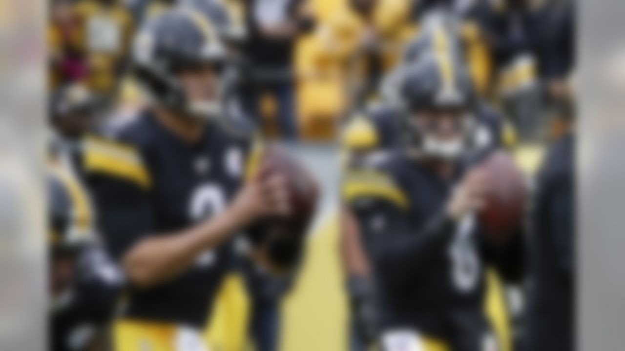 Pittsburgh Steelers quarterbacks Mason Rudolph (2) and Devlin Hodges (6) warm up before an NFL football game against the Cleveland Browns, Sunday, Dec. 1, 2019, in Pittsburgh. (AP Photo/Gene J. Puskar)