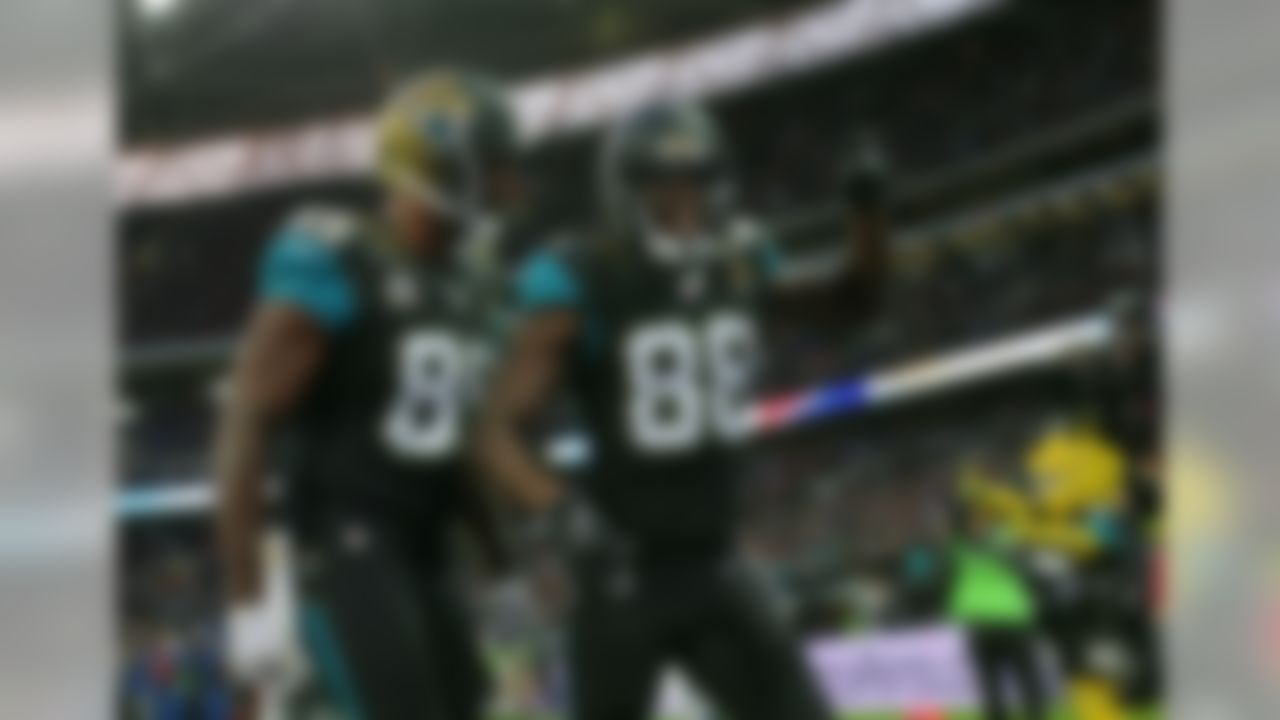 Jacksonville Jaguars wide receiver Allen Hurns (88), right, celebrates after catching the ball for a touchdown during the NFL game between Buffalo Bills and Jacksonville Jaguars at Wembley Stadium in London,  Sunday, Oct. 25, 2015. (AP Photo/Tim Ireland)