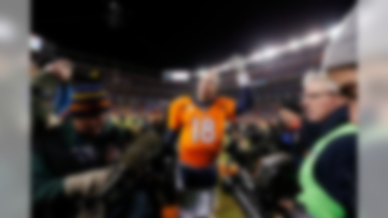 Denver Broncos quarterback Peyton Manning (18) waves to the fans after an NFL divisional playoff football game against the Pittsburgh Steelers on Sunday, Jan. 17, 2016 in Denver. (Ric Tapia/NFL)