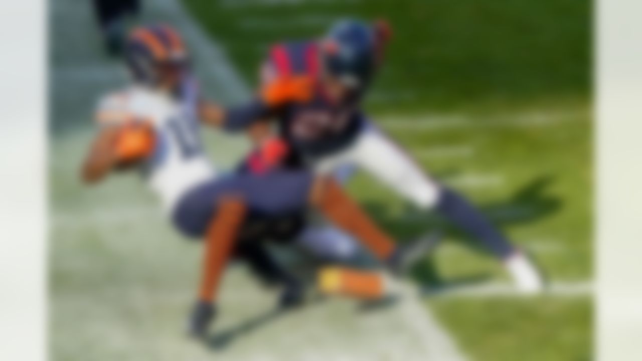 Bears wide receiver Darnell Mooney (11) scores a touchdown against the Houston Texans at Soldier Field in Chicago.