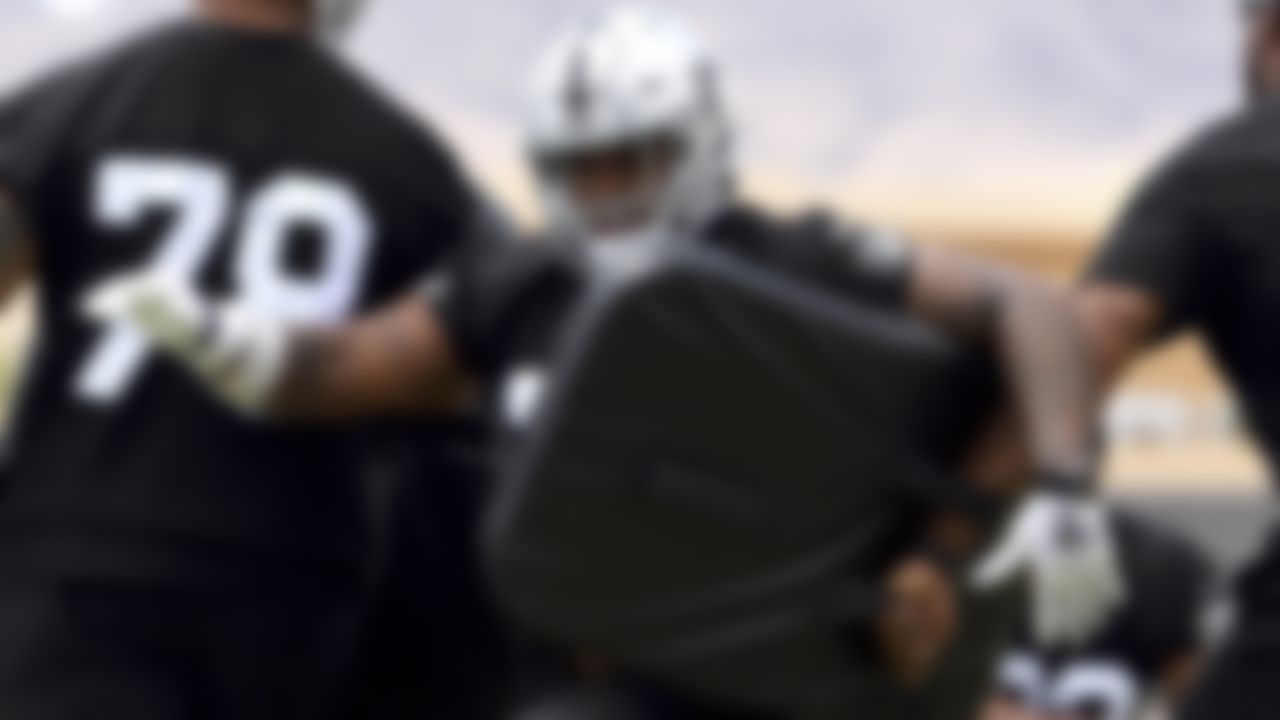 Las Vegas Raiders defensive tackle Darius Stills performs a drill during an NFL football organized team activity at the team's training facility Wednesday, May 26, 2021, in Henderson, Nev.